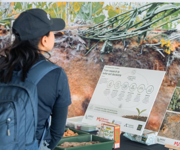 An attendee explores the SoilsWest display at Dowerin Machinery Field Days